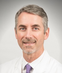 Dennis E Johnson, MD